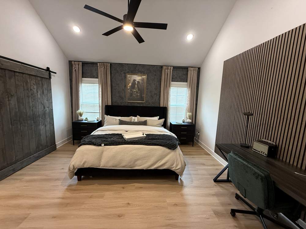 Primary bedroom with king bed