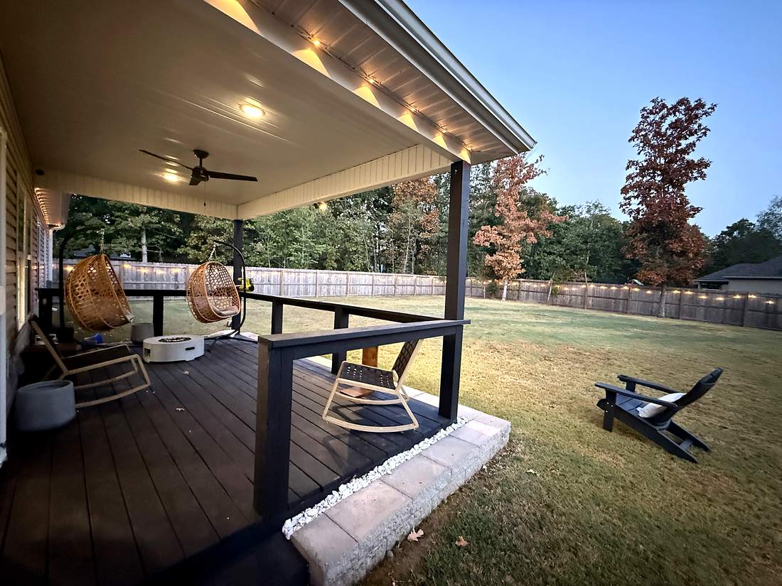 Covered back deck with hanging chairs